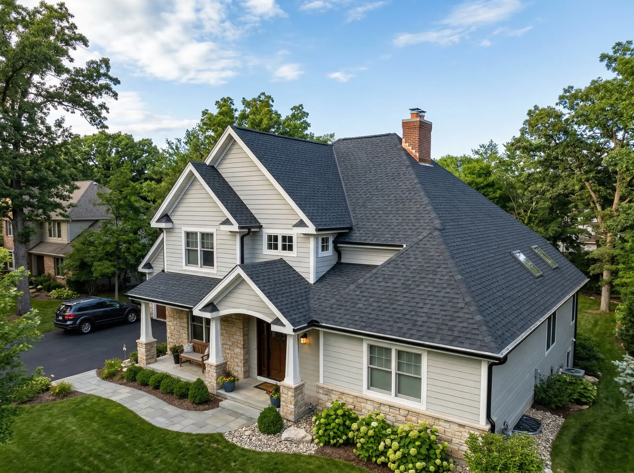 Exterior remodeler completing roof and masonry work on a home in Lake County, OH